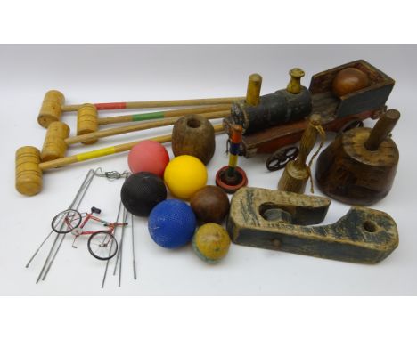 Vintage croquet set, treen mallet, masher, painted wooden model of a train, block and tackle pulley and miscellanea  Conditio