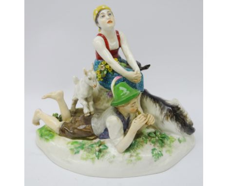 Meissen model of a Goatherd and his lass on a rocky outcrop, blue cross swords mark to base no. V124, L22cm  Condition Report