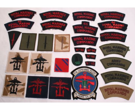 Selection of Royal Marines Commando Insignia, consisting of 2x ROYAL MARINE COMMANDO titles, embroidered red on navy blue No4