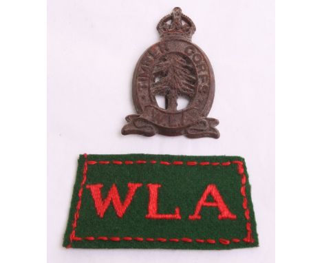 Scarce WW2 Women’s Land Army Tmber Corps WLA Plastic Cap Badge, brown Bakelite with blade fittings on the reverse and A Stanl