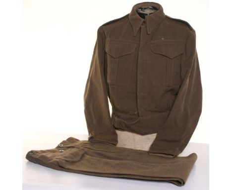 WW2 New Zealand Made War Aid Battle Dress Set, consisting of plain battle dress blouse with ink stampings to the interior lin