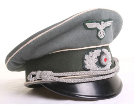 German Army Infantry Officers Peaked Cap, complete with officers bullion cap eagle and cockade. Officers chin cords supported