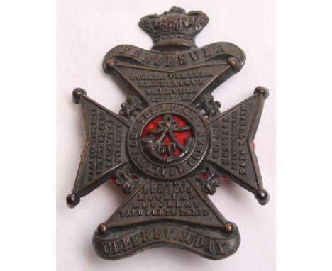 Victorian 60th Foot Other Ranks Glengarry Badge circa 1874-1881, being a 2nd pattern blackened example. Maltese cross with ba