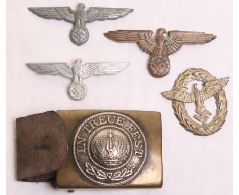 Waffen SS Peaked Cap Eagle, being an early copper based example with some of the copper metal showing through the frosted sil