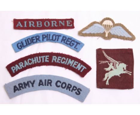 Selection of Parachute Regiment / Airborne Cloth Insignia consisting of embroidered straight AIRBORNE title, Parachute Regime