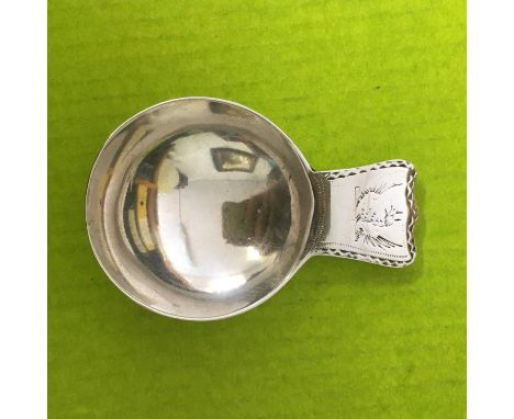 A SILVER CADDY SPOON - LATE GEORGIAN MARKS RUBBED - BRIGHT CUT ENGRAVING TO STEM