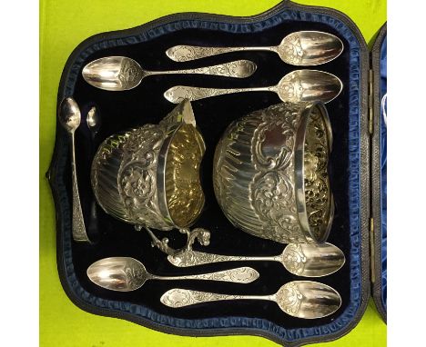 A CASED SILVER SUCRIER AND CREAM JUG WITH SIX TEASPOONS AND A PAIR OF SUGAR TONGS - LONDON 1891