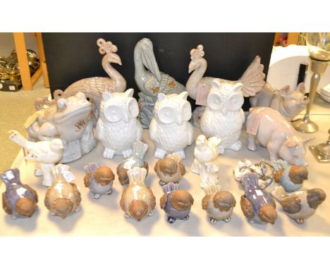 Interior design - A pair of ceramic models of pigs; others similar, crane, frog, birds of paradise; owls; birds 