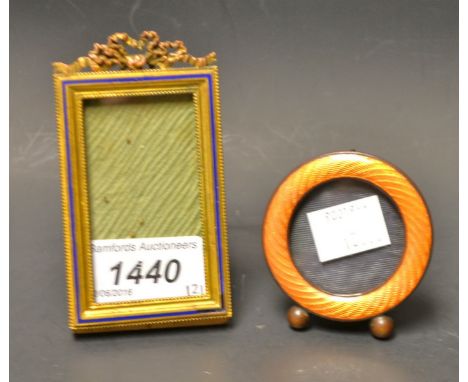 Two gilt and enamel photograph frames