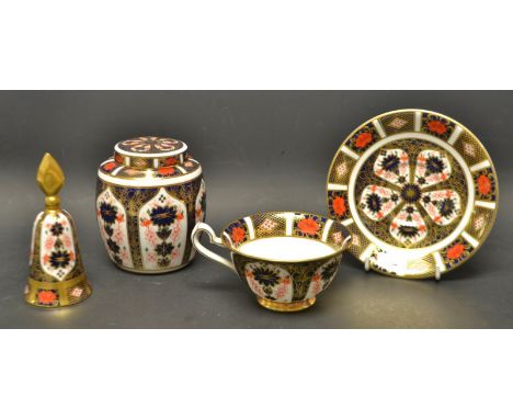 A Royal Crown Derby 1128 Imari small ginger jar and cover; a Dublin low shaped cup and saucer and candle snuffer similar , fi