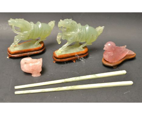 A pair of Chinese jade horses, on hardwood stands; a pair of chopsticks; two rose quartz ducks