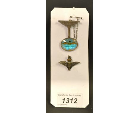 A silver RAF pendant; a silver and enamel paratroops badge