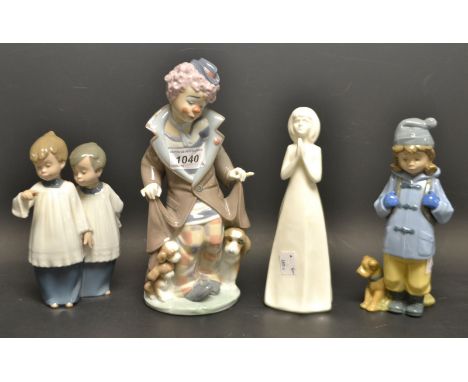 A Lladro model of a clown; other Nao Spanish porcelain figures; a royal Doulton Images white glazed model; etc