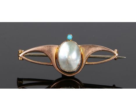 Art Nouveau brooch, set with a pearl section and turquoise below to the yellow metal brooch, 40mm diameter 