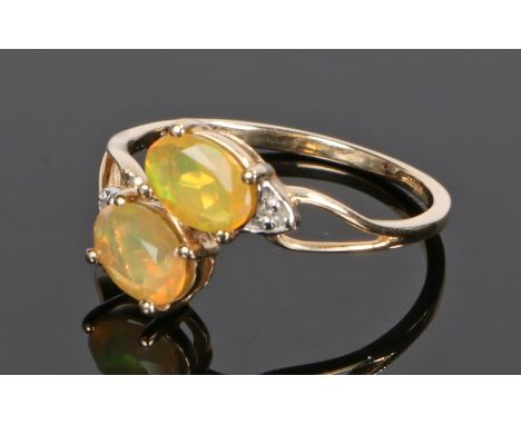 10 carat gold opal set ring, with a pair of opals to the head, ring size Q