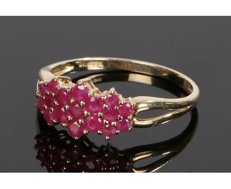 9 carat gold ruby set ring, with seventeen rubies to the head, ring size Q