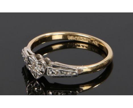 18 carat gold diamond set ring, with a heart and central diamond, 2.4 grams, ring size M 1/2