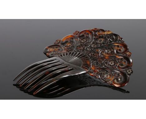 Early 20th Century tortoiseshell hair slide, with foliate scroll design and six comb prongs, 17.5cm long