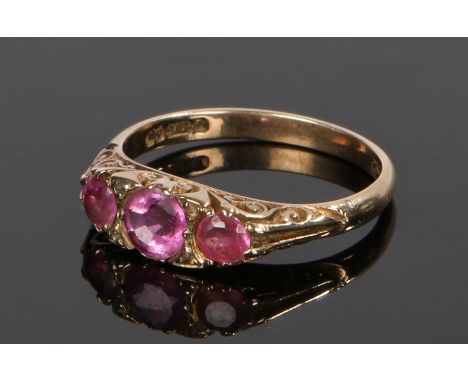 9 carat gold ring, set with three pink stones, ring size O 1/2