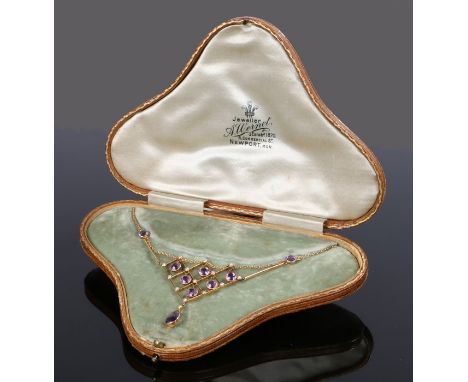 Edwardian amethyst and pearl set necklace, with a row of round cut amethysts and pear cut drop interspersed by pearls, cased 