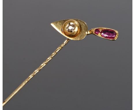 Novelty diamond and ruby stick pin, in the form of a trowel with a diamond to the blade and rubies to the handle, the trowel 