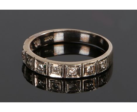 18 carat white gold and diamond set half eternity ring, with nine round cut diamonds to the shank, 3.9 grams, ring size Q