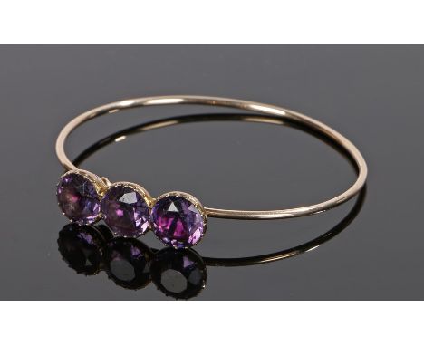 19th Century amethyst set bracelet, with three round cut amethysts to the head, 63mm diameter 