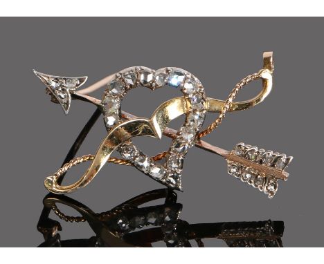 French gold and diamond set brooch, with a rose cut diamond set heart and arrow to the centre, 34mm diameter 