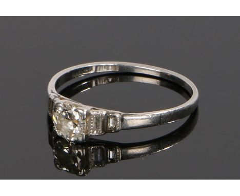 Platinum and diamond set ring, the round cut diamond at approximately 0.40 carat, ring size M 1/2 