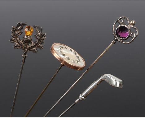 Four vintage hat pins, a silver Charles Horner hat pin with a decorative amethyst &amp; scroll work top, a silver hat pin wit