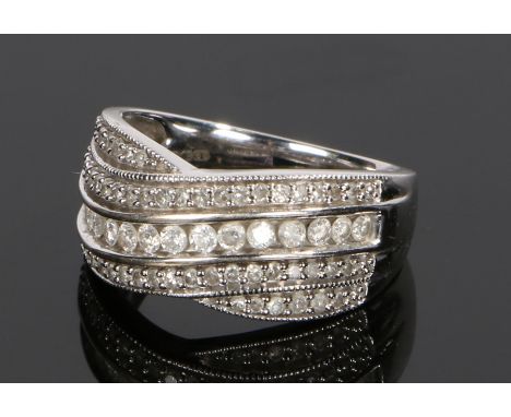 18 carat white gold diamond set ring, the cross over head in four bands set with diamonds at a total weight of 0.50 carats, r