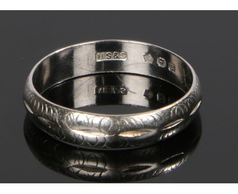 Platinum wedding band, with dash design, ring size K, 2.6 grams