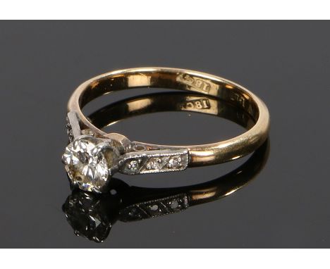 18 carat gold diamond set ring, the round cut diamond at approximately 0.40 carat, ring size L 