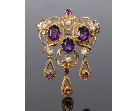 9 carat gold amethyst and pearl set bracelet, with three oval facetted amethyst to the centre with a pearl and amethyst drop 