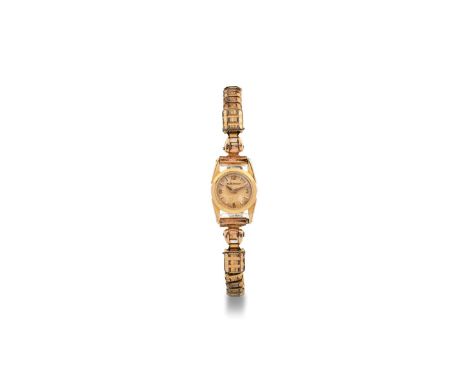 Jaeger-LeCoultre Mini Duoplan, 1960s. Round case in 18k rose gold. Cream-colored dial, applied hour markers and Arabic numera