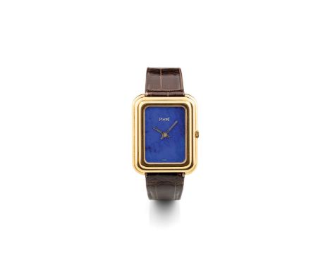 Piaget 14101 caliber Beta 21, 1970s Rectangular stepped case in 18k gold. Lapis lazuli stone dial. Quartz movement. Leather s