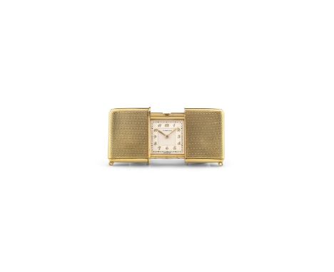 Movado-Tiffany Ermeto , 1930s. Rectangular 14k solid gold. Silvered two tone dial, applied Arabic numerals. Hand-winding move