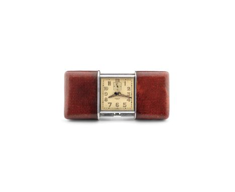 Movado Ermeto Pullmann, 1930s. Rectangular steel and chrome-plated metal case, slide opening with leather cover. Cream-colore