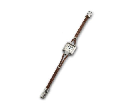 Jaeger-LeCoultre Mini Duoplan, 1940s. Square steel case. Silvered dial, painted hour markers and Arabic numerals. Hand-windin