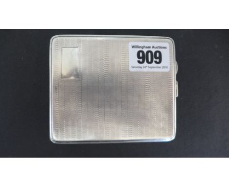 A silver cigarette case hallmarked Birmingham 1930/31, engine turned finish - approx weight 4 troy oz - some slight deformati
