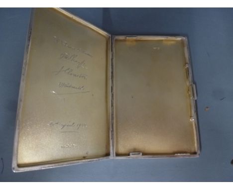 A silver cigarette case hallmarked Sheffield 1937/38 engine turned finish with initials monogrammed to top W.J.W.T - signed t