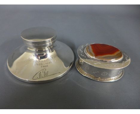 A silver hallmarked inkwell with hinged lid and glass liner engraved to front and a silver hallmarked oval pin tray with hing