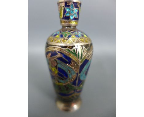 A silver and enamel scent bottle - Height 7cm - some damage to enamel , stick top loose