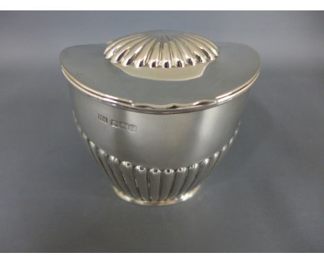A silver hallmarked tea caddy, ribbed design to top and sides hallmark for Sheffield 1915-16  approx. 6 troy oz. Condition: c