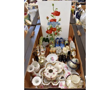 Various decorative ceramics and glass including floral-painted candlestick on gilt metal base, pair of glass flutes on mirror
