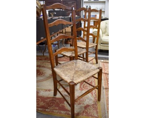 A trio of oak high ladder back provincial&nbsp; side chairs with rush seats&nbsp;