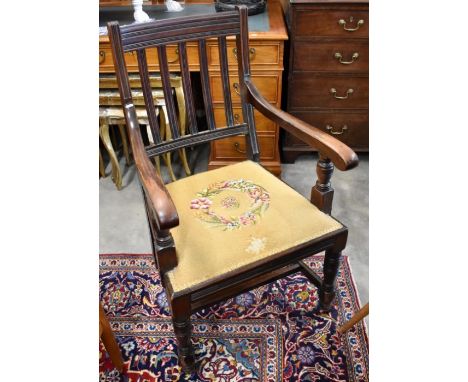 An early 20th century mahogany framed armchair with floral tapestry seat&nbsp;