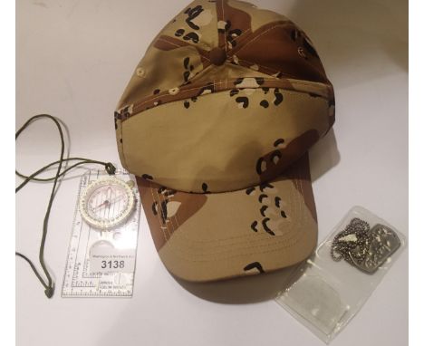 Mixed military items, to include camouflage hat, dog tags, and a field compass. P&amp;P Group 1 (£14+VAT for the first lot an