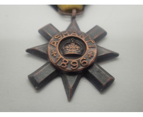 British Victorian Ashanti Star Medal, unnamed as issued, 1896 to front and 'From the Queen' verso, with ribbon. P&amp;P Group