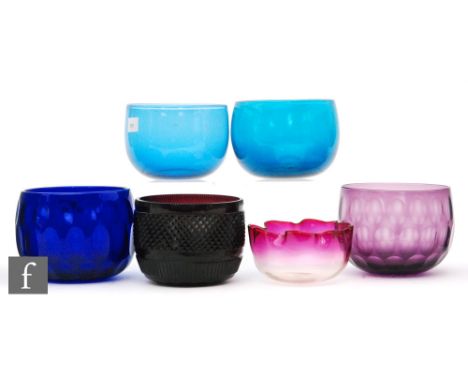 A collection of six 19th Century finger bowls to include a blue and an amethyst bowl cut with a repeat oval pattern, an ameth
